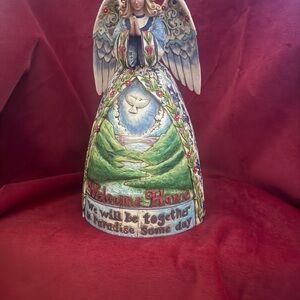 Colorful Angel Figurine with Welcome Message